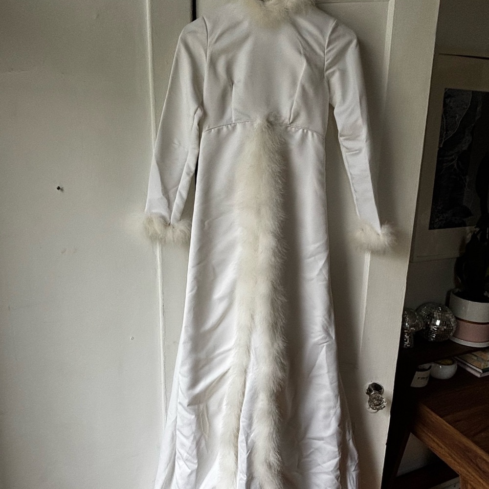 Elegant White Faux Fur Trimmed Gown
